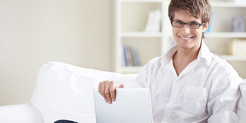 A young man with laptop