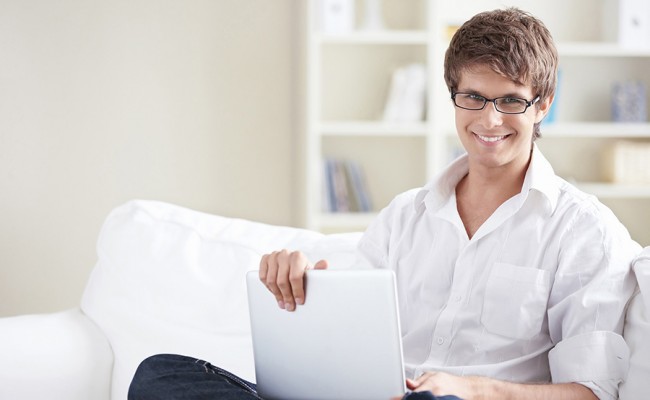 A young man with laptop